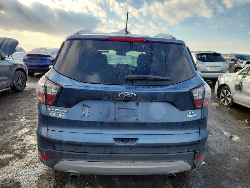 Photo 6 from auction – 2018 FORD ESCAPE SE with VIN 1FMCU9GD7JUB02562