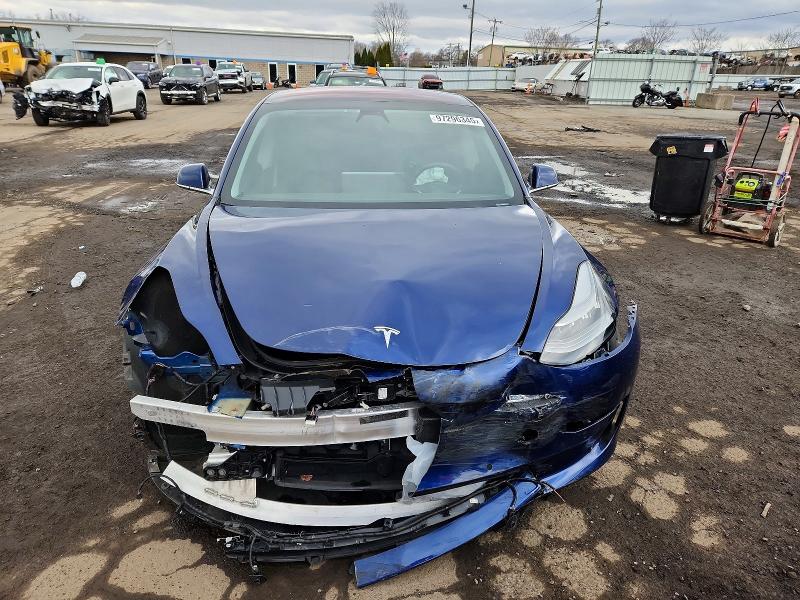 Photo 5 from auction – 2018 TESLA MODEL 3 with VIN 5YJ3E1EB5JF093745
