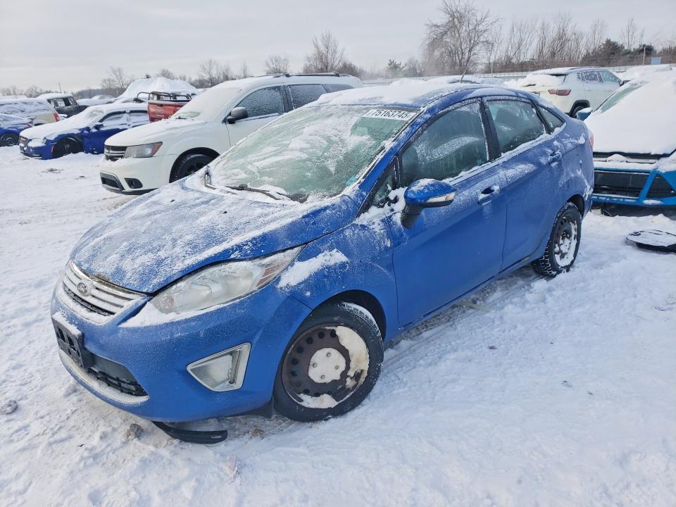 FORD FIESTA 2011 with VIN 3FADP4CJ4BM120575 - Photo from auction
