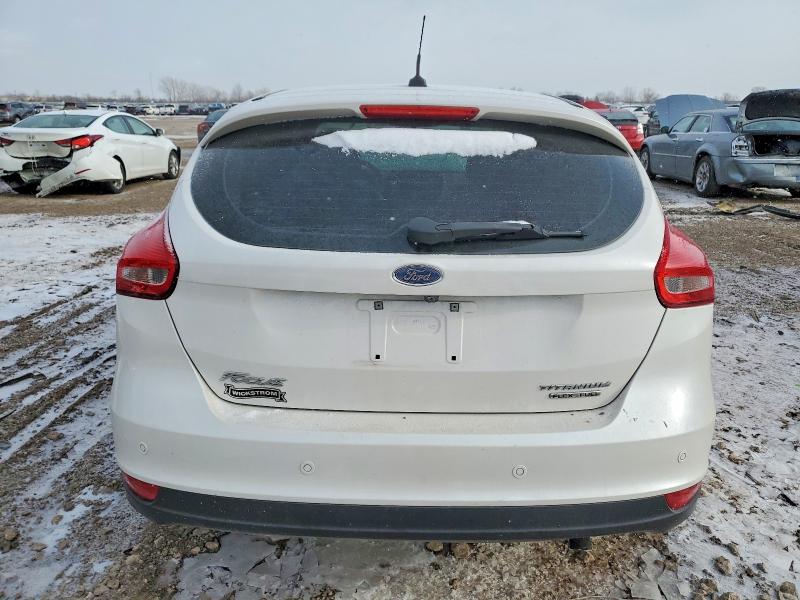 Photo 6 from auction – 2016 FORD FOCUS TITA with VIN 1FADP3N23GL359608