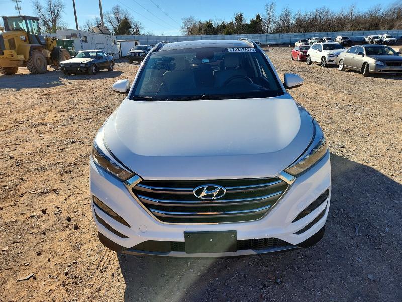 Photo 5 from auction – 2016 HYUNDAI TUCSON LIM with VIN KM8J33A27GU149680