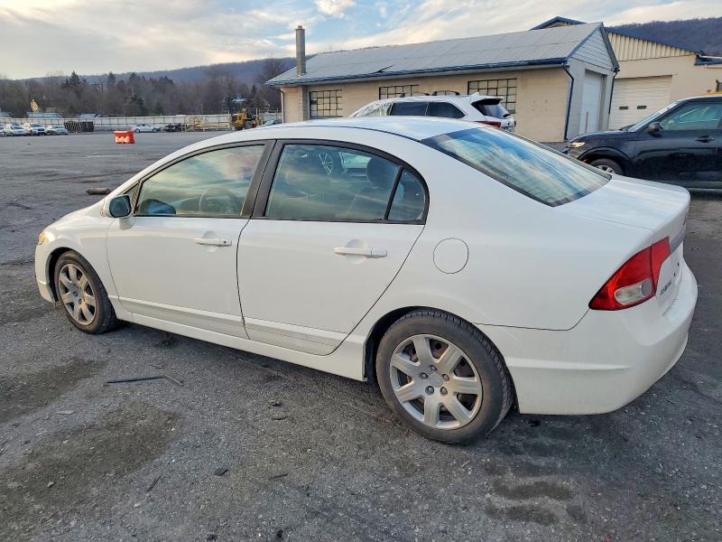 Photo 2 from auction – 2011 HONDA CIVIC LX with VIN 2HGFA1F52BH309906