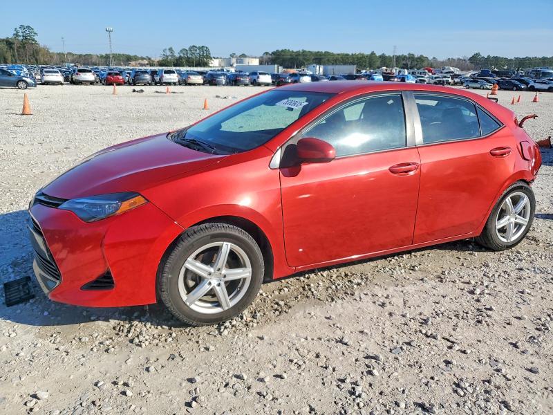 TOYOTA COROLLA L 2019 with VIN 5YFBURHE2KP859407 - Photo from auction