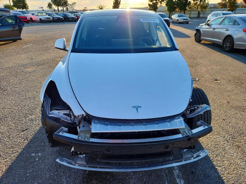 Photo 5 from auction – 2023 TESLA MODEL Y with VIN 7SAYGAEE5PF713130