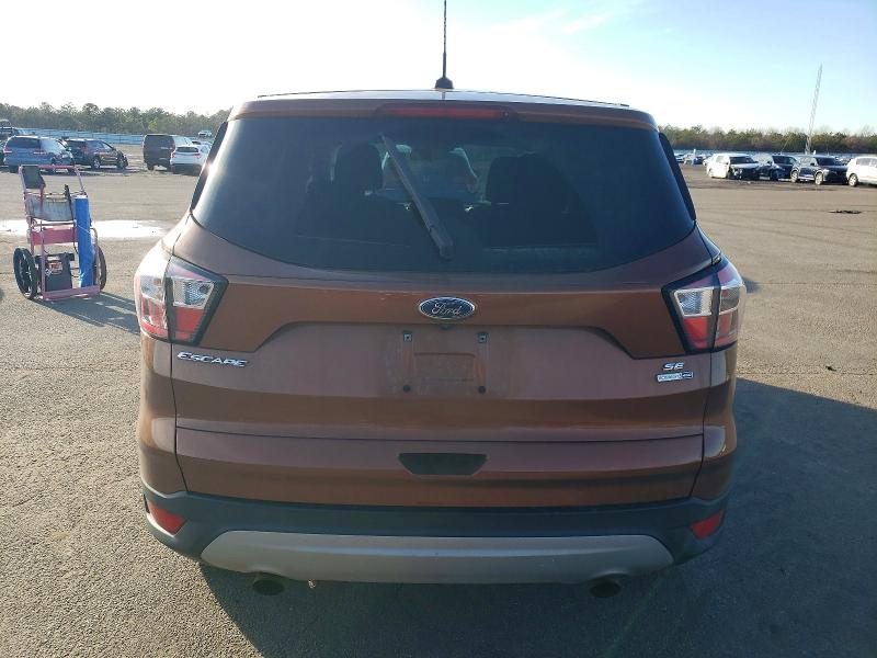 Photo 6 from auction – 2017 FORD ESCAPE with VIN 1FMCU9GD9HUD90160
