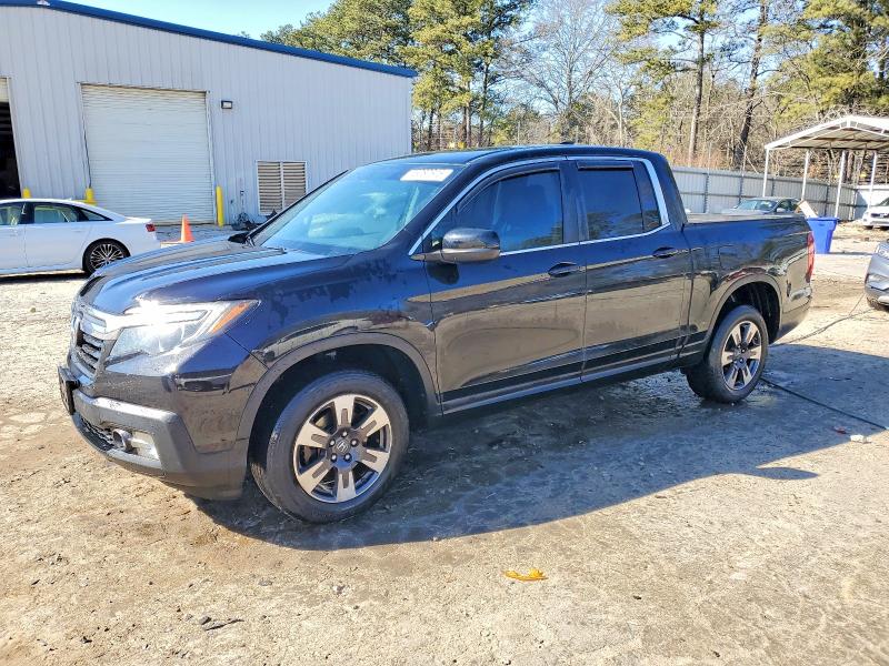 HONDA RIDGELINE 2017 with VIN 5FPYK3F53HB019714 - Photo from auction