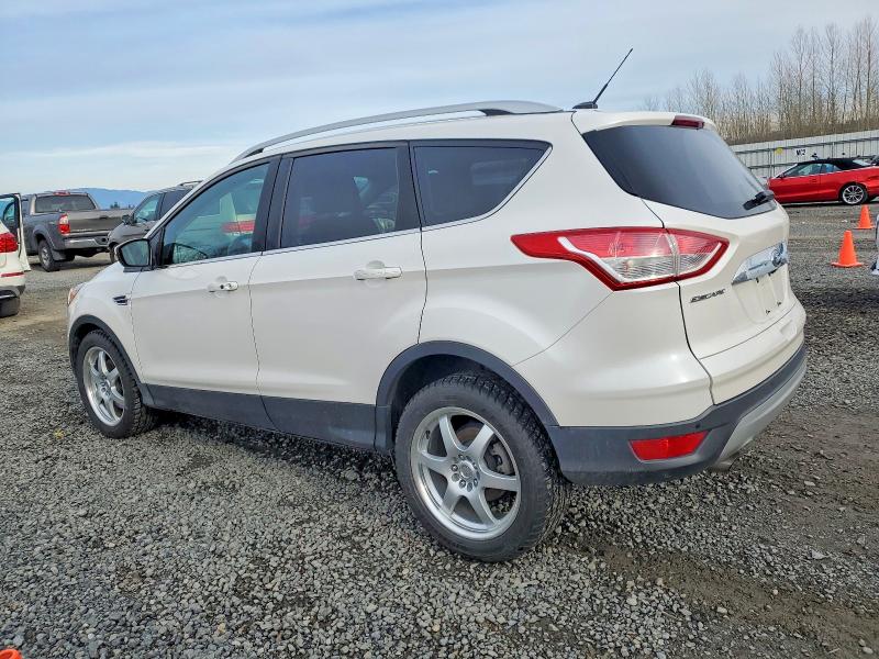 Photo 2 from auction – 2014 FORD ESCAPE TIT with VIN 1FMCU9J99EUD93334