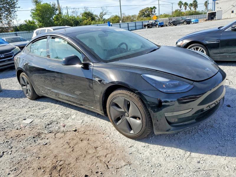 Photo 4 from auction – 2022 TESLA MODEL 3 with VIN 5YJ3E1EA8NF322206