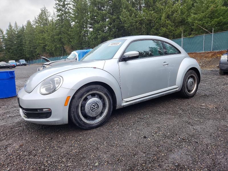 VOLKSWAGEN BEETLE 2012 with VIN 3VWJP7AT0CM657882 - Photo from auction