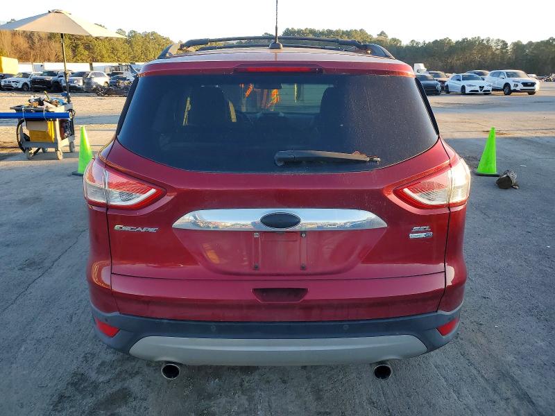 Photo 6 from auction – 2013 FORD ESCAPE with VIN 1FMCU9H92DUB35645