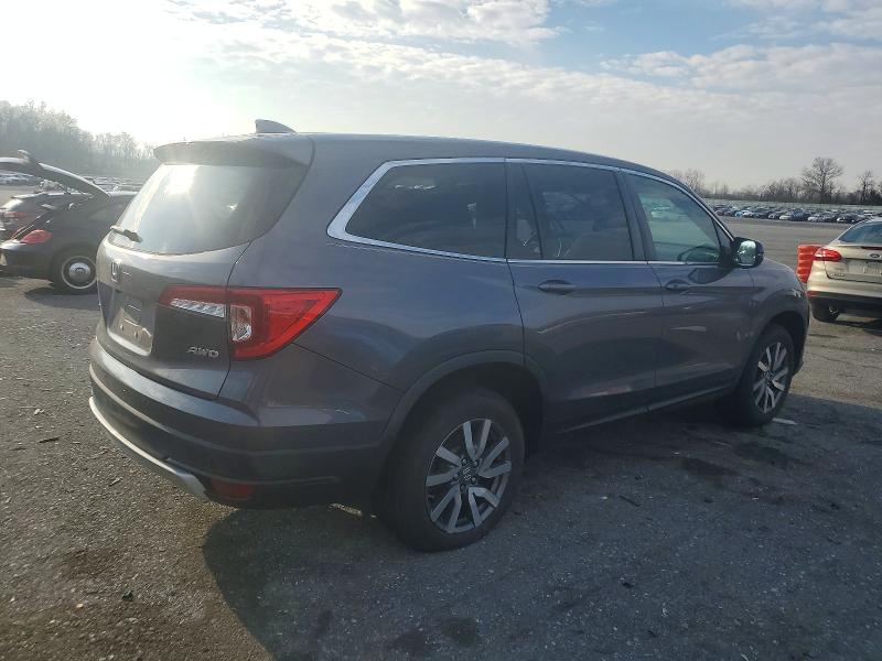 Photo 3 from auction – 2021 HONDA PILOT EXL with VIN 5FNYF6H50MB033561