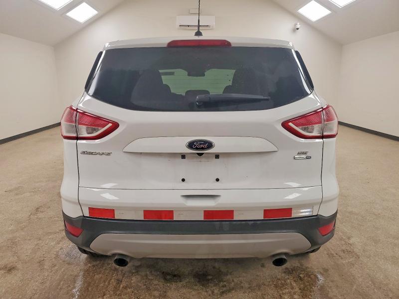 Photo 6 from auction – 2016 FORD ESCAPE with VIN 1FMCU9GXXGUC36811