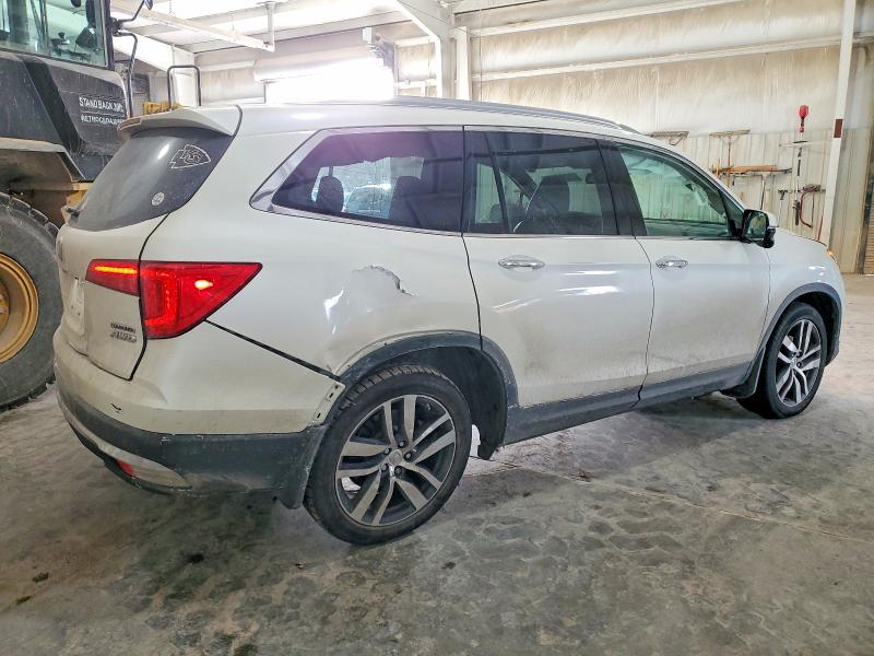 Photo 3 from auction – 2016 HONDA PILOT TOUR with VIN 5FNYF6H91GB031907