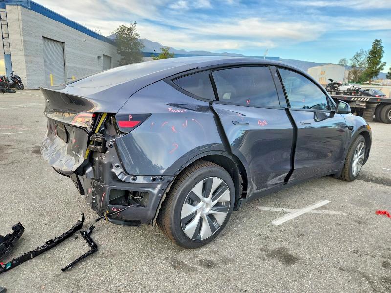 Photo 3 from auction – 2022 TESLA MODEL Y with VIN 7SAYGDEE2NF339641