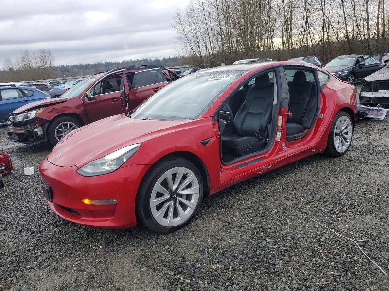TESLA MODEL 3 2021 with VIN 5YJ3E1EB4MF935690 - Photo from auction