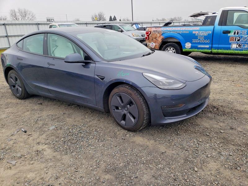 Photo 4 from auction – 2022 TESLA MODEL 3 with VIN 5YJ3E1EA9NF360172