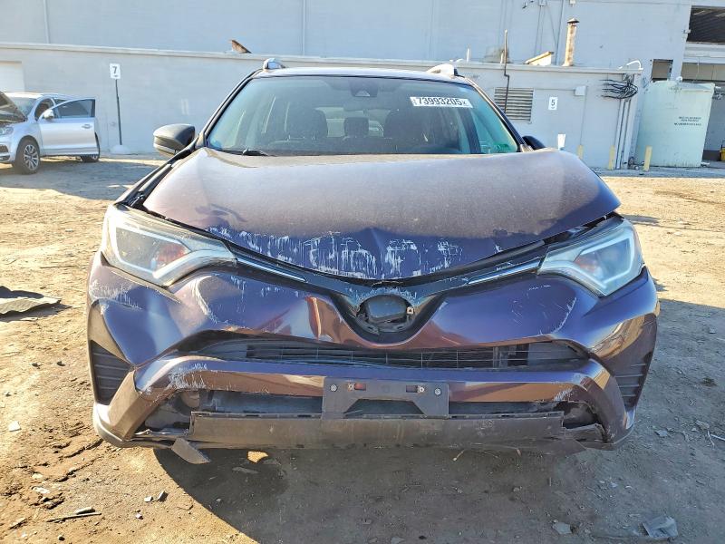 Photo 5 from auction – 2018 TOYOTA RAV4 LE with VIN 2T3BFREV9JW715341