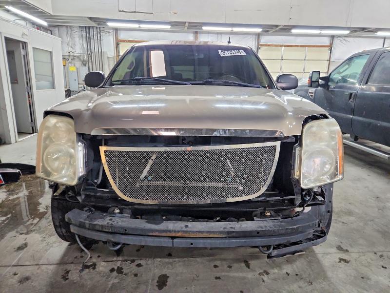 Photo 5 from auction – 2007 GMC YUKON with VIN 1GKFK13017J334651