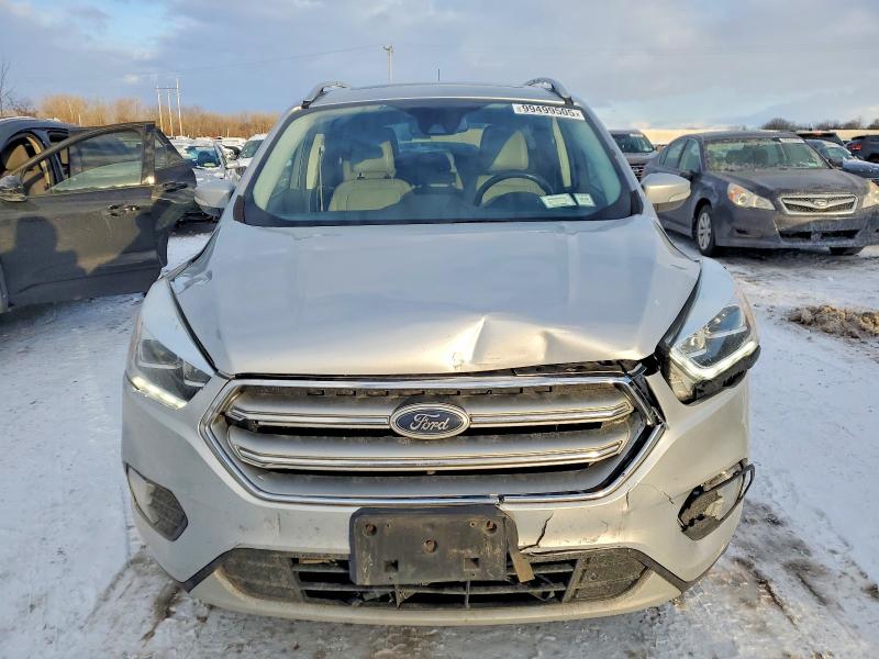 Photo 5 from auction – 2017 FORD ESCAPE TIT with VIN 1FMCU9J96HUE31977
