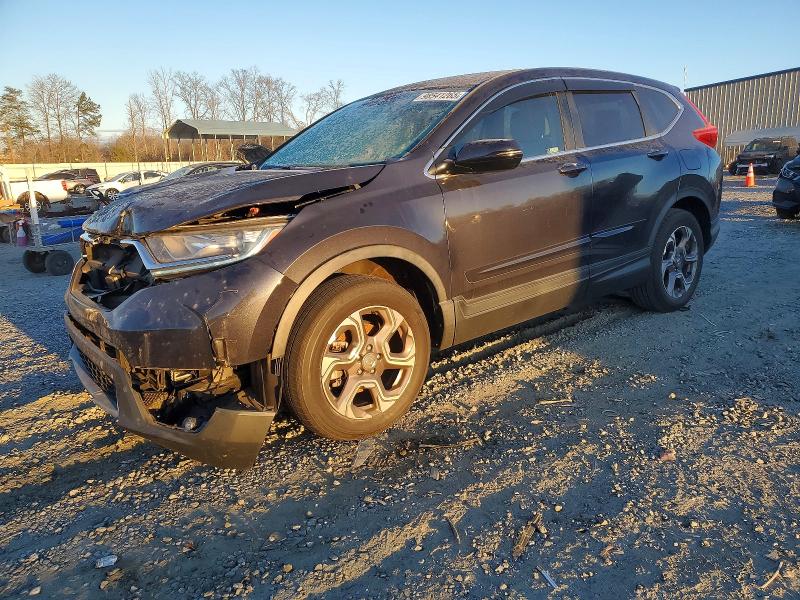 HONDA CR-V EX 2018 with VIN 7FARW2H56JE103660 - Photo from auction