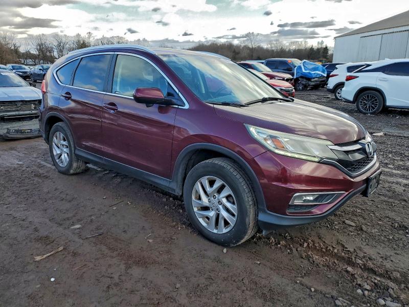 Photo 4 from auction – 2015 HONDA CR-V EXL with VIN 2HKRM4H72FH668141