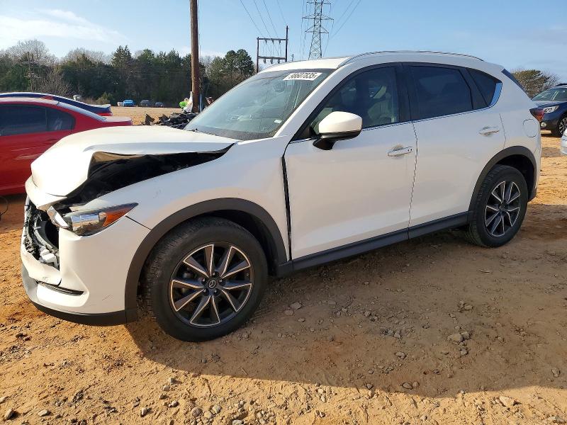 MAZDA CX-5 2018 with VIN JM3KFACM9J0327047 - Photo from auction