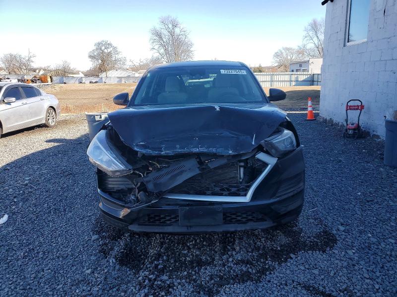 Photo 5 from auction – 2019 HYUNDAI TUCSON SE with VIN KM8J2CA42KU073170