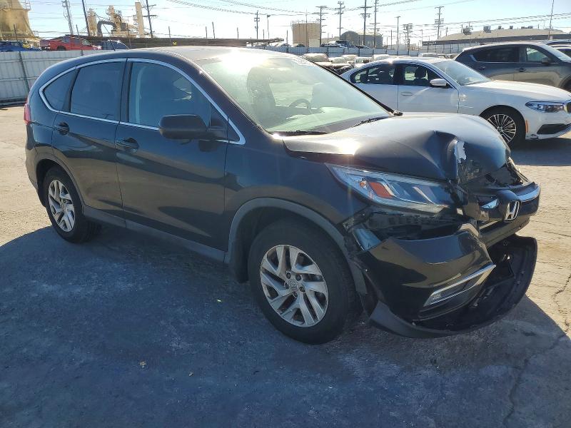 Photo 4 from auction – 2015 HONDA CR-V EX with VIN 2HKRM3H56FH513326