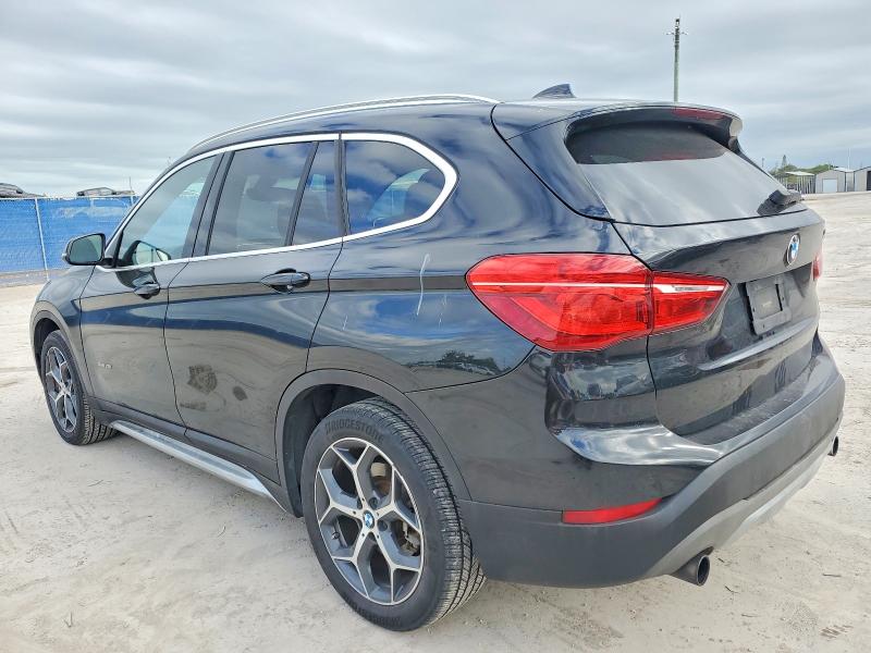 Photo 2 from auction – 2017 BMW X1 XDRIVE2 with VIN WBXHT3C31H5F74029