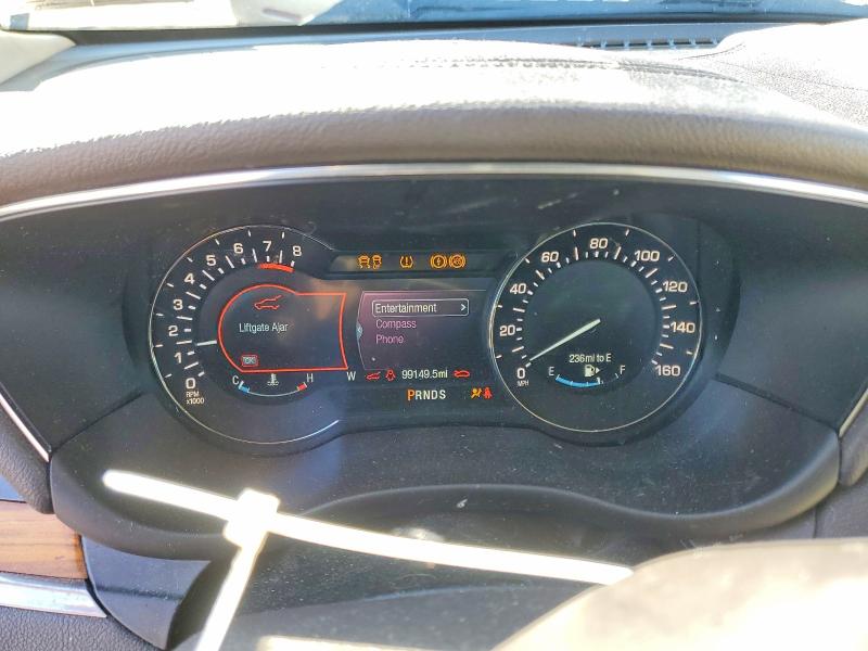 Photo 9 from auction – 2015 LINCOLN MKC with VIN 5LMCJ2A95FUJ09776