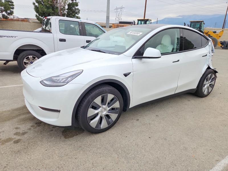 TESLA MODEL Y 2023 with VIN 7SAYGDEE0PA153306 - Photo from auction