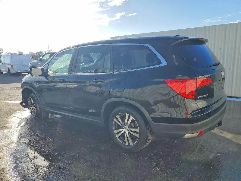 Photo 2 from auction – 2016 HONDA PILOT with VIN 5FNYF5H56GB059919