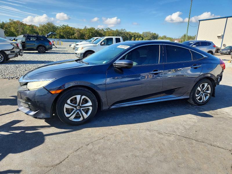 HONDA CIVIC LX 2018 with VIN 19XFC2F50JE004882 - Photo from auction