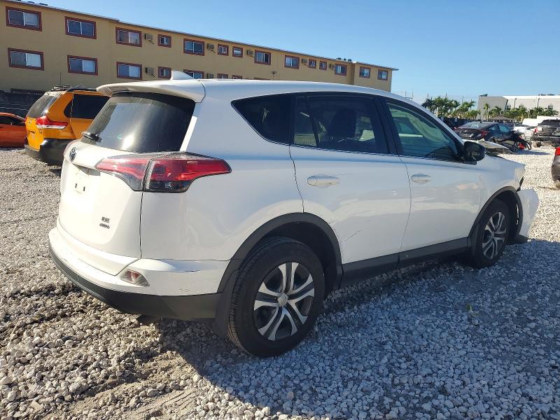 Photo 3 from auction – 2018 TOYOTA RAV4 LE with VIN JTMBFREV1JJ246003