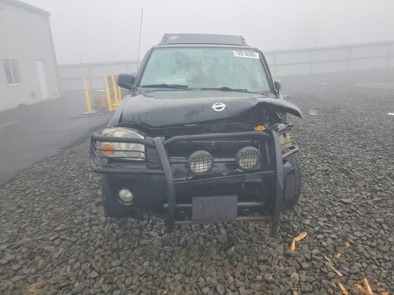 Photo 5 from auction – 2002 NISSAN FRONTIER C with VIN 1N6MD29Y22C352490