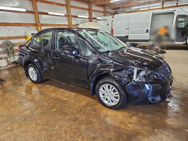 Photo 4 from auction – 2012 SUZUKI SX4 LE with VIN JS2YC5A39C6304080