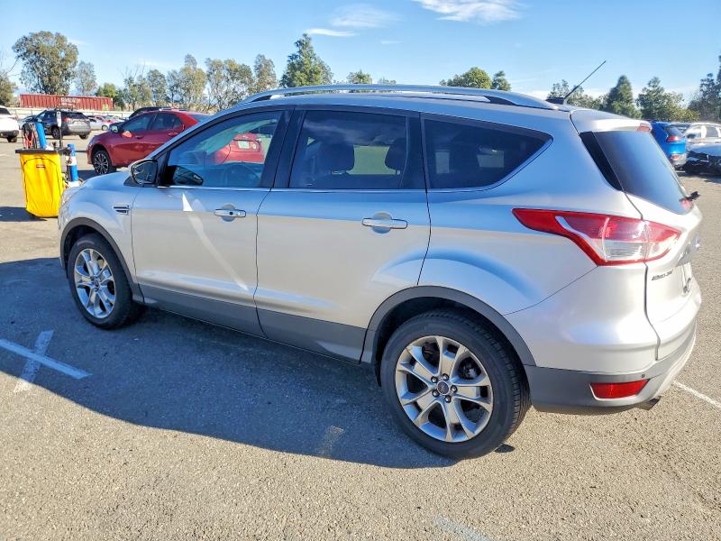 Photo 2 from auction – 2015 FORD ESCAPE TIT with VIN 1FMCU0J99FUA32943