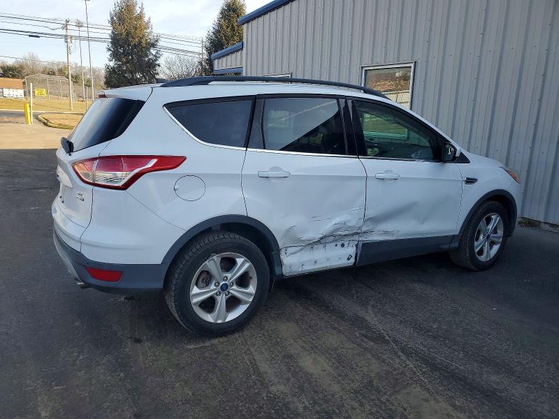 Photo 3 from auction – 2016 FORD ESCAPE SE with VIN 1FMCU9GX9GUA55117