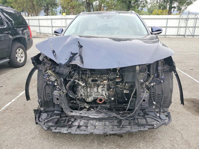 Photo 5 from auction – 2021 LEXUS RX with VIN 2T2HZMAA5MC210866