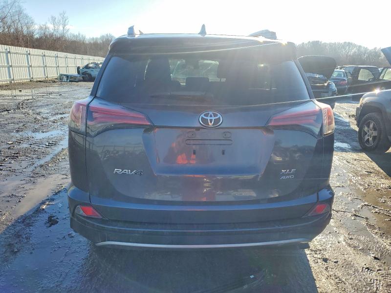 Photo 6 from auction – 2017 TOYOTA RAV4 XLE with VIN 2T3RFREVXHW547220