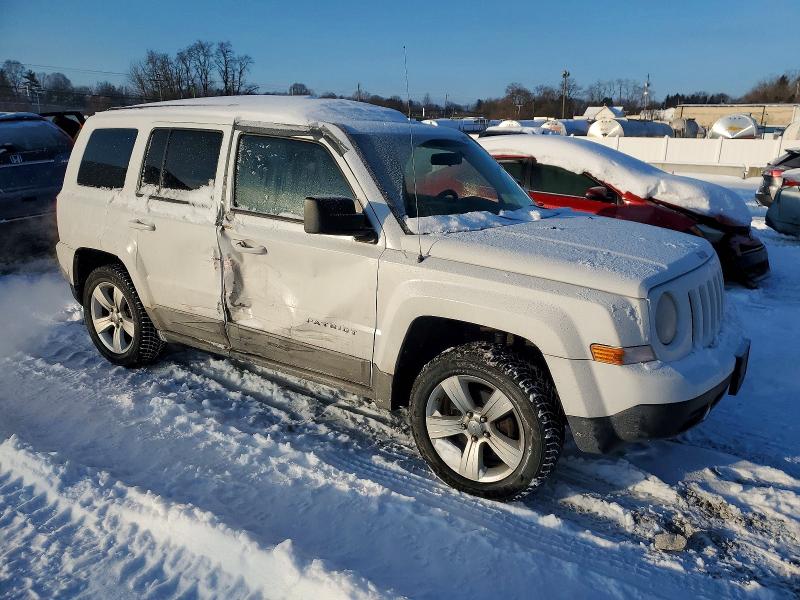 Photo 4 from auction – 2011 JEEP PATRIOT with VIN 1J4NT1GB2BD123251