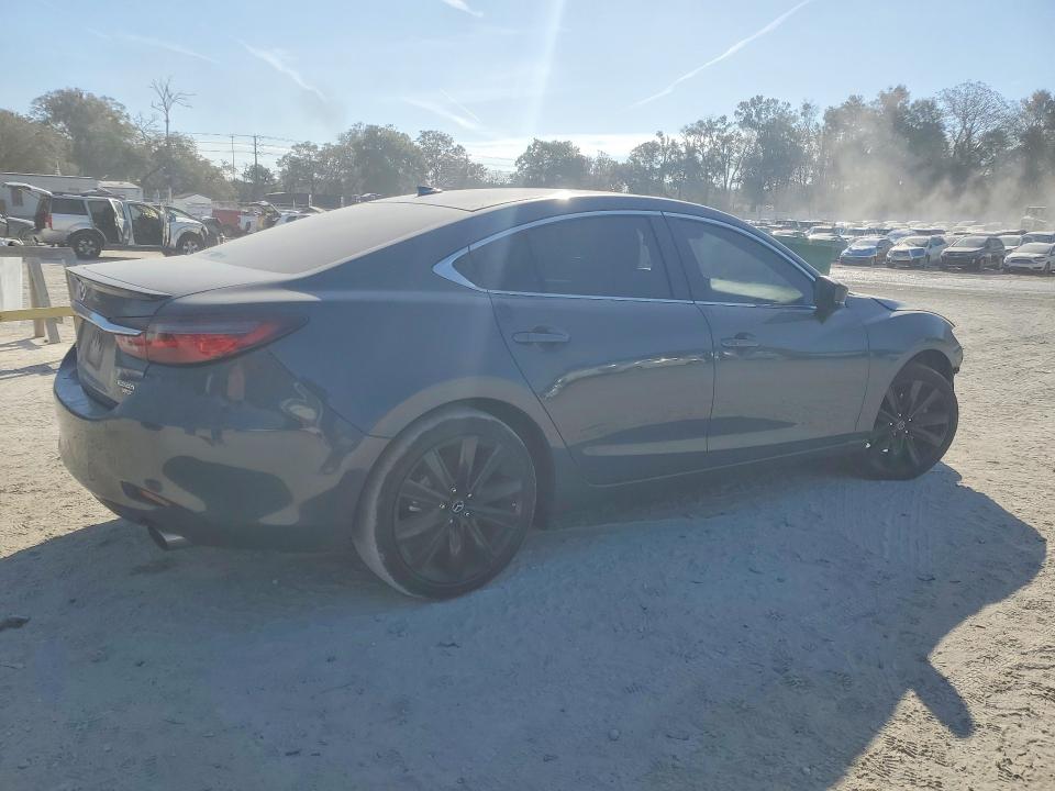 Photo 3 from auction – 2021 MAZDA 6 with VIN JM1GL1WY1M1611843