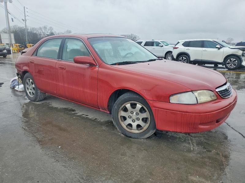 Photo 4 from auction – 1999 MAZDA 626 with VIN 1YVGF22C3X5818622