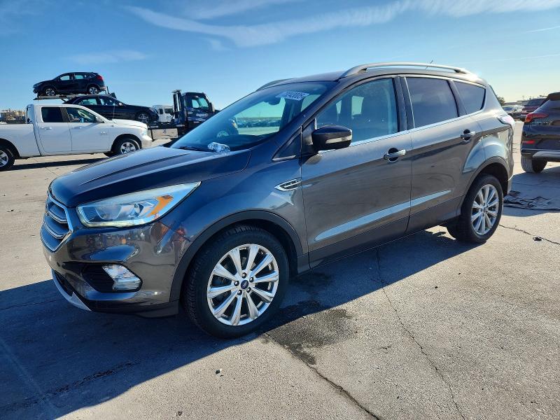 FORD ESCAPE TIT 2017 with VIN 1FMCU0JD2HUC72617 - Photo from auction