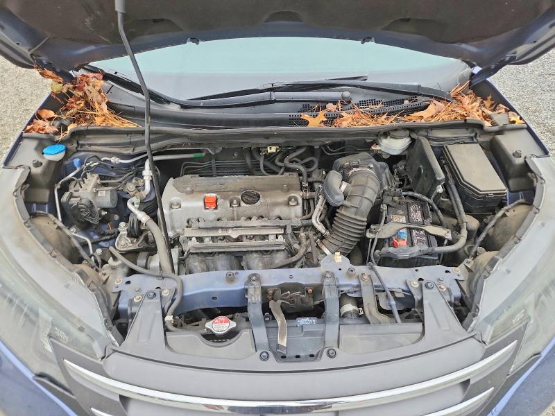 Photo 11 from auction – 2013 HONDA CR-V LX with VIN 2HKRM4H3XDH688972