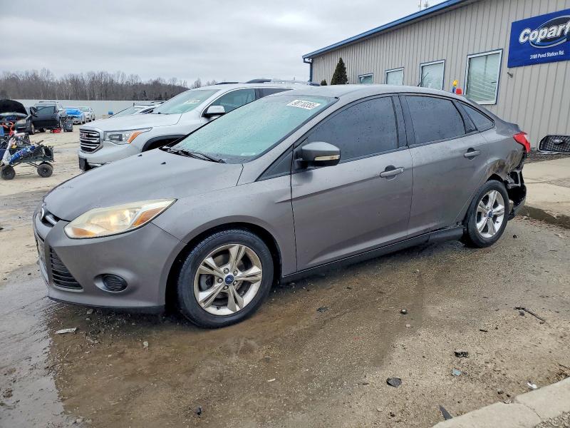FORD FOCUS SE 2014 with VIN 1FADP3F24EL157890 - Photo from auction