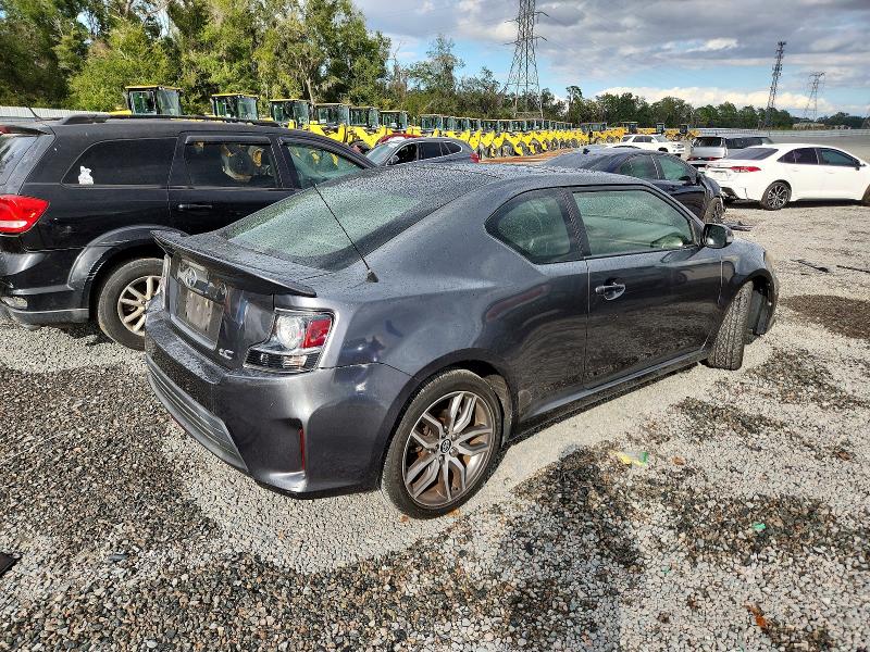 Photo 3 from auction – 2014 TOYOTA SCION TC with VIN JTKJF5C79E3088036