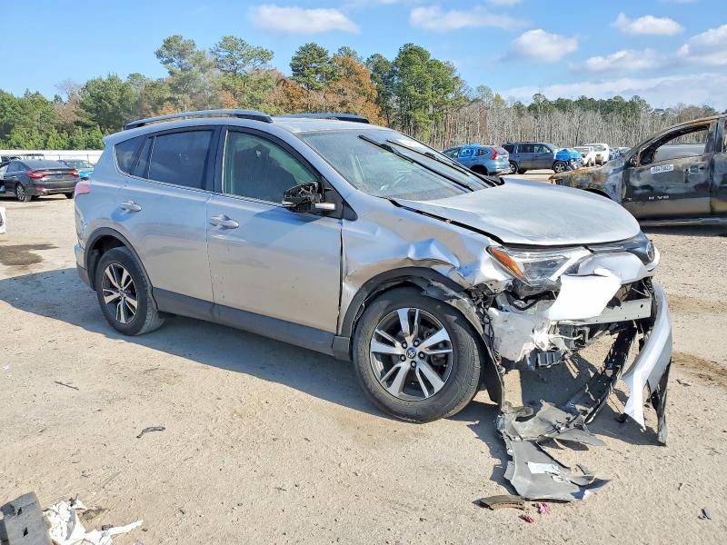 Photo 4 from auction – 2018 TOYOTA RAV4 with VIN JTMWFREV2JJ199761