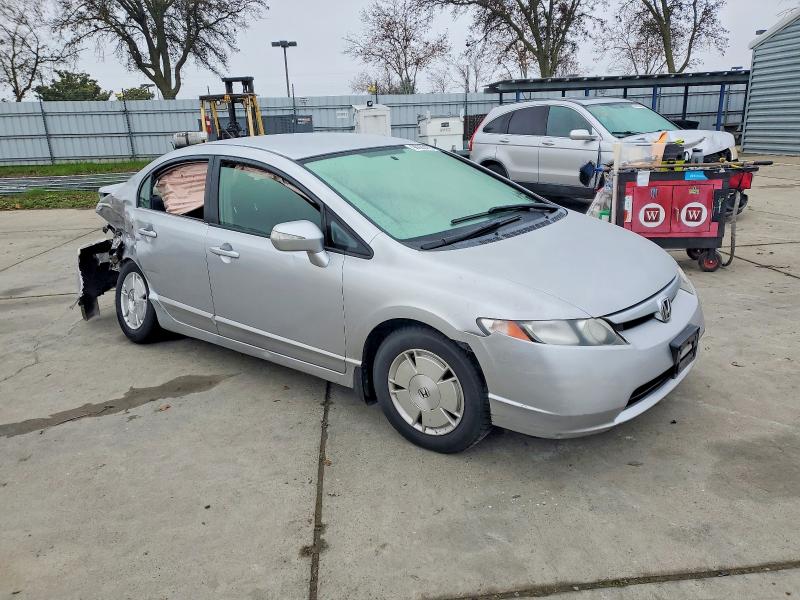 Photo 4 from auction – 2007 HONDA CIVIC HYBR with VIN JHMFA36277S022947