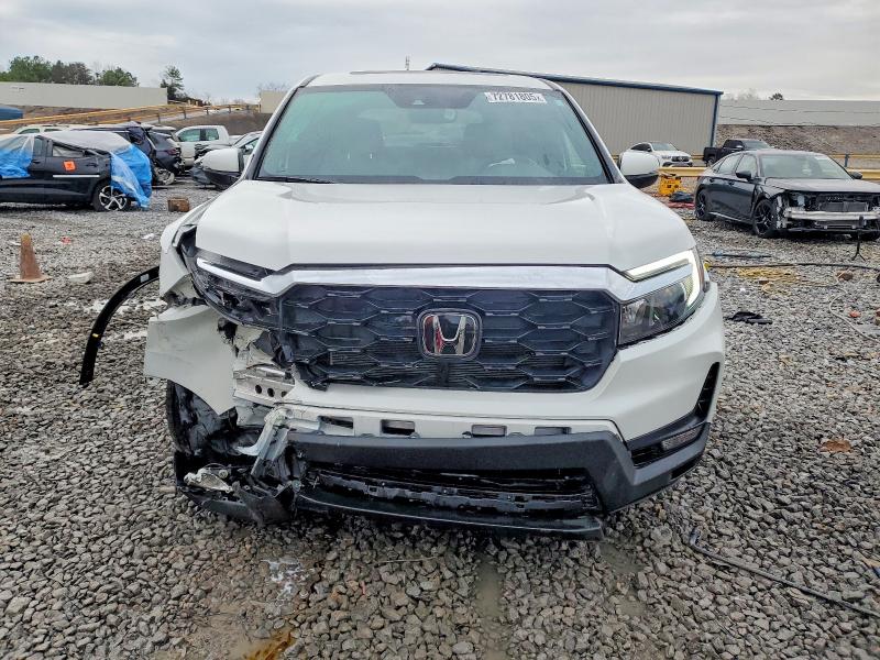 Photo 5 from auction – 2023 HONDA PASSPORT with VIN 5FNYF8H53PB040343